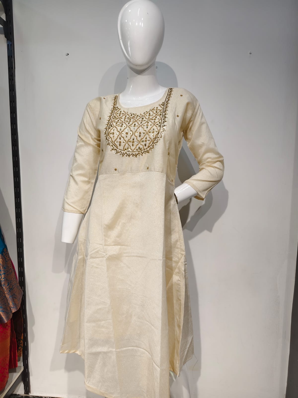 Ivory Elegance Hand-Embroidered A-Line Kurti